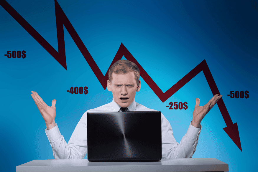 Trader reagiert frustriert auf fallende Kurse und hohe Verluste und erlebt die Auswirkungen eines starken Drawdowns